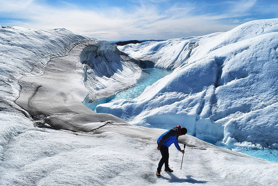 Rains erode the Greenland ice sheet. Why is this dangerous?
